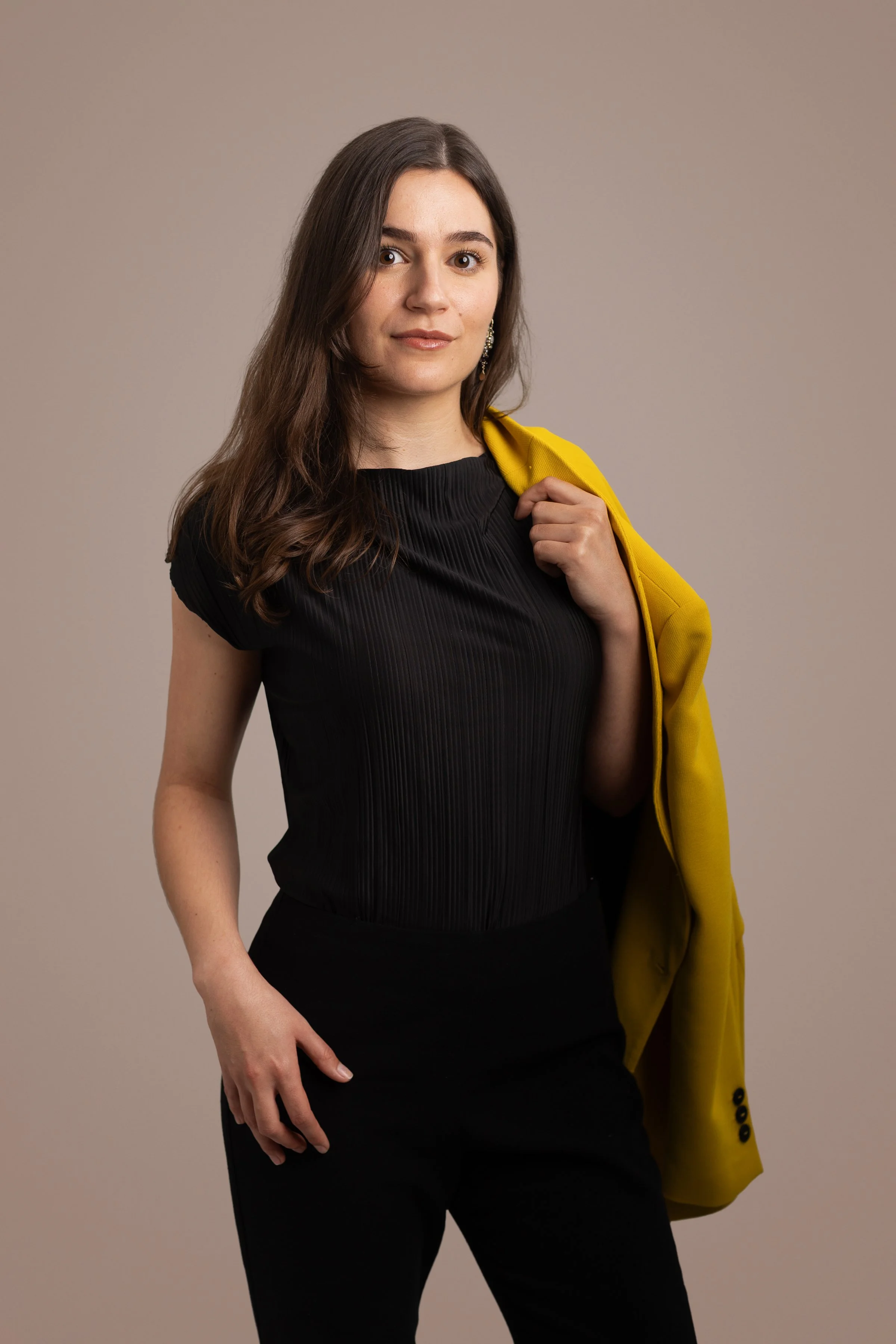 Femke Munting, Co-Founder of Amralytics, smiling in a professional portrait
